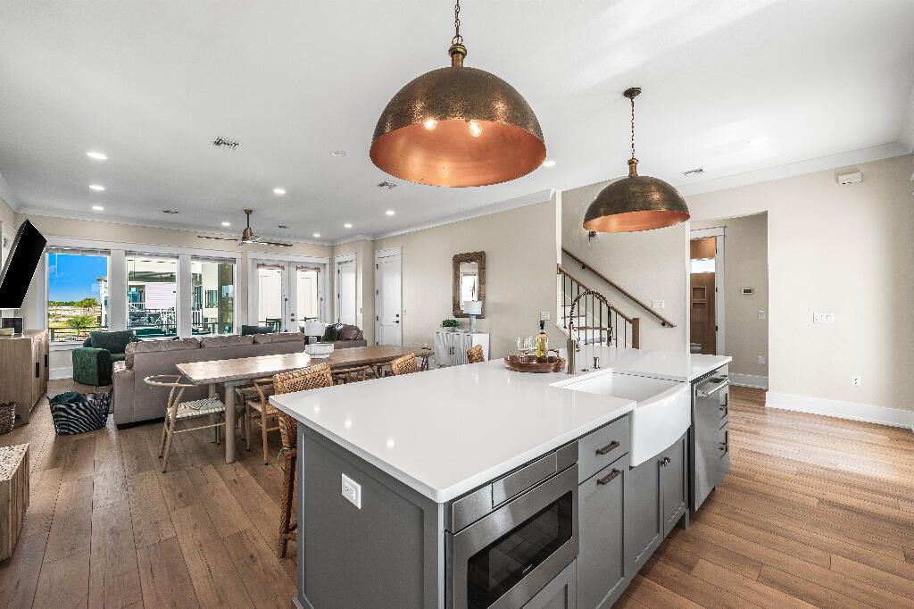 Dining room, Interior, Kitchen, Living room, Pendant Lights, Recessed Lighting, Stainless Steel Appliances, Wood Texture Flooring