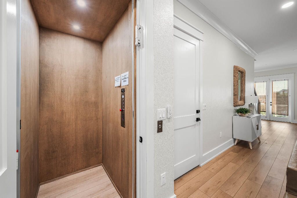 Elevator, Interior, Recessed Lighting, Wood Texture Flooring, Wooden Walls