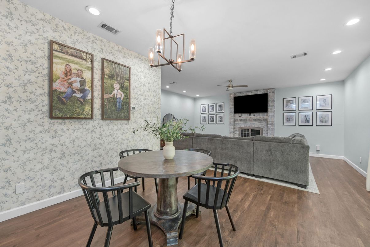 Dining room, Fireplace, Interior, Living room, Pendant Lights, Recessed Lighting, Wood Texture Flooring