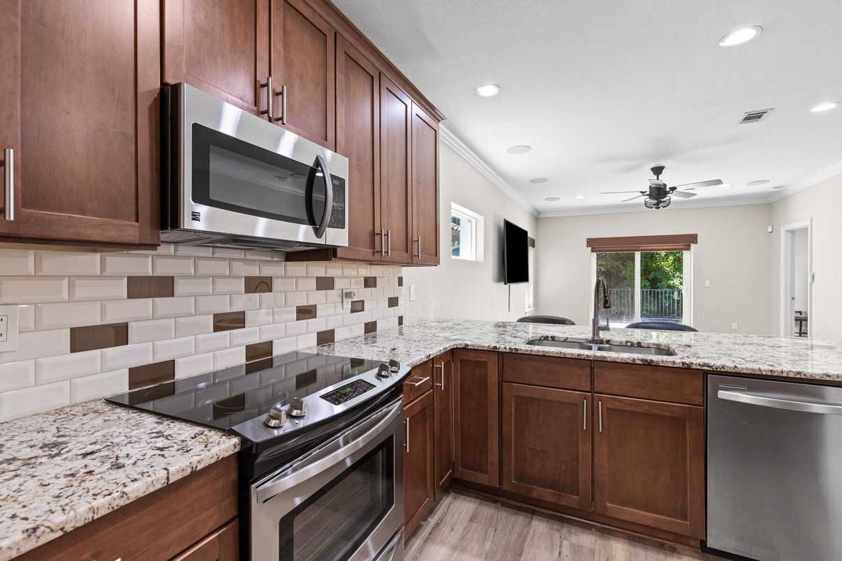 Interior, Kitchen, Recessed Lighting, Stainless Steel Appliances, Wood Texture Flooring