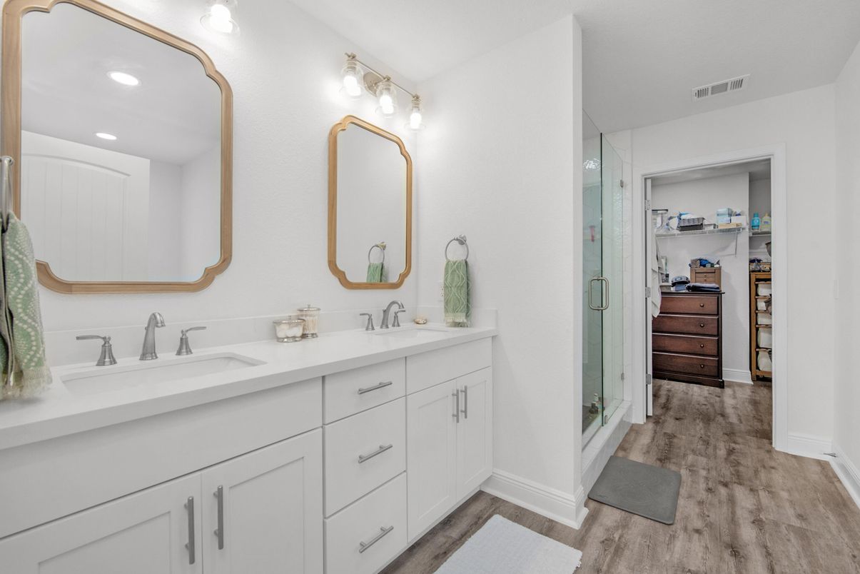 Bathroom, Dual Sink Vanities, Glass Shower, Interior, Recessed Lighting, Walk-in Closets, Wood Texture Flooring
