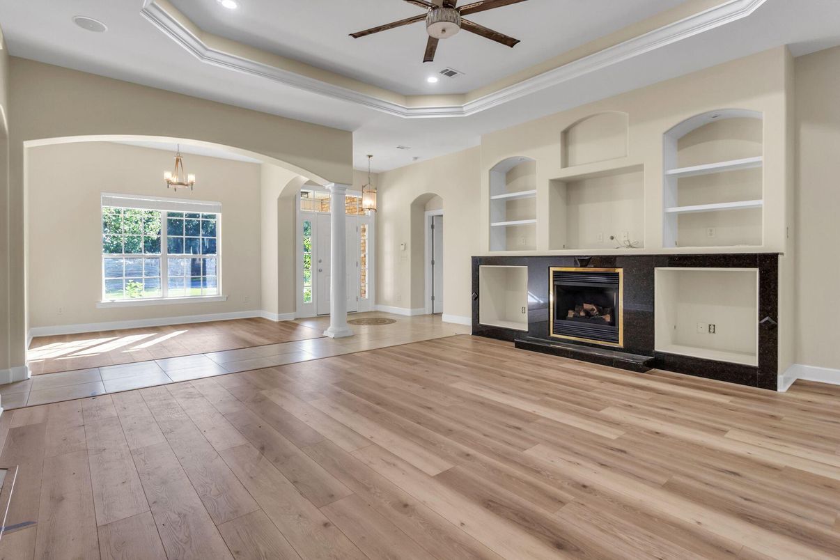 Chandelier, Empty room, Fireplace, Interior, Pendant Lights, Recessed Lighting, Wood Texture Flooring