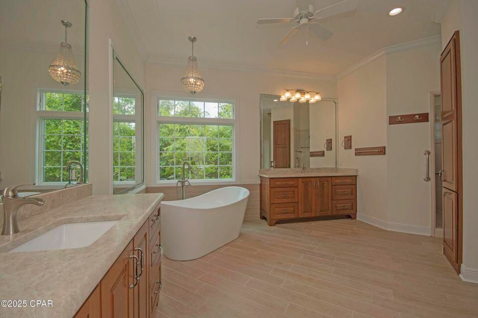 Bathroom, Chandelier, Dual Sink Vanities, Free Standing Baths, Interior, Pendant Lights, Recessed Lighting, Wood Texture Flooring