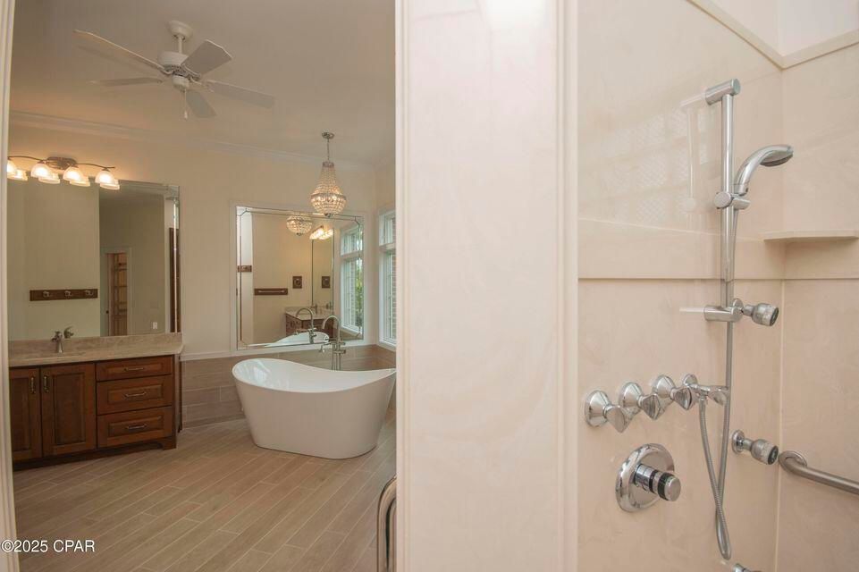 Bathroom, Chandelier, Dual Sink Vanities, Free Standing Baths, Interior, Wood Texture Flooring