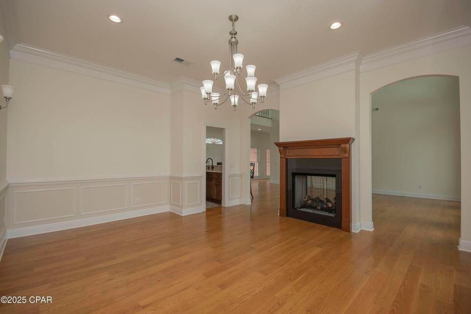 Chandelier, Empty room, Fireplace, Interior, Recessed Lighting, Wood Texture Flooring