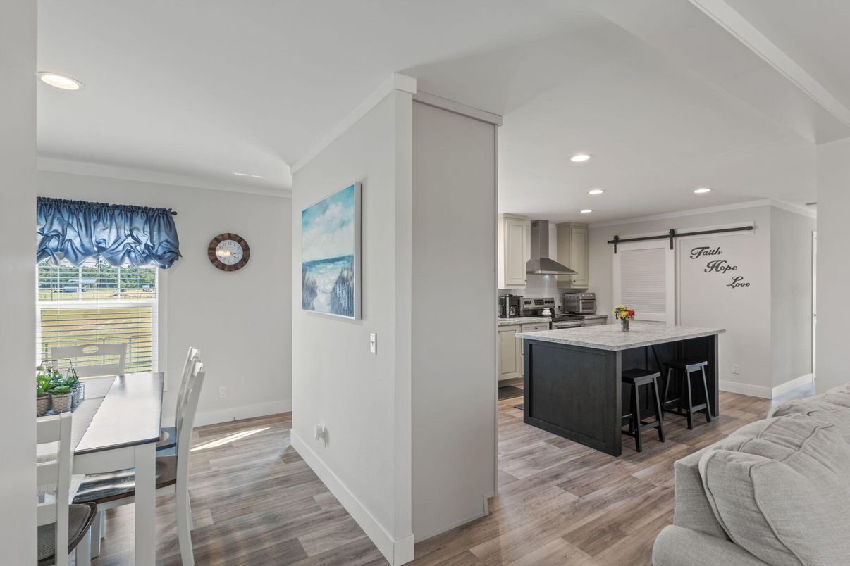 Dining room, Interior, Kitchen, Recessed Lighting, Stainless Steel Appliances, Wood Texture Flooring
