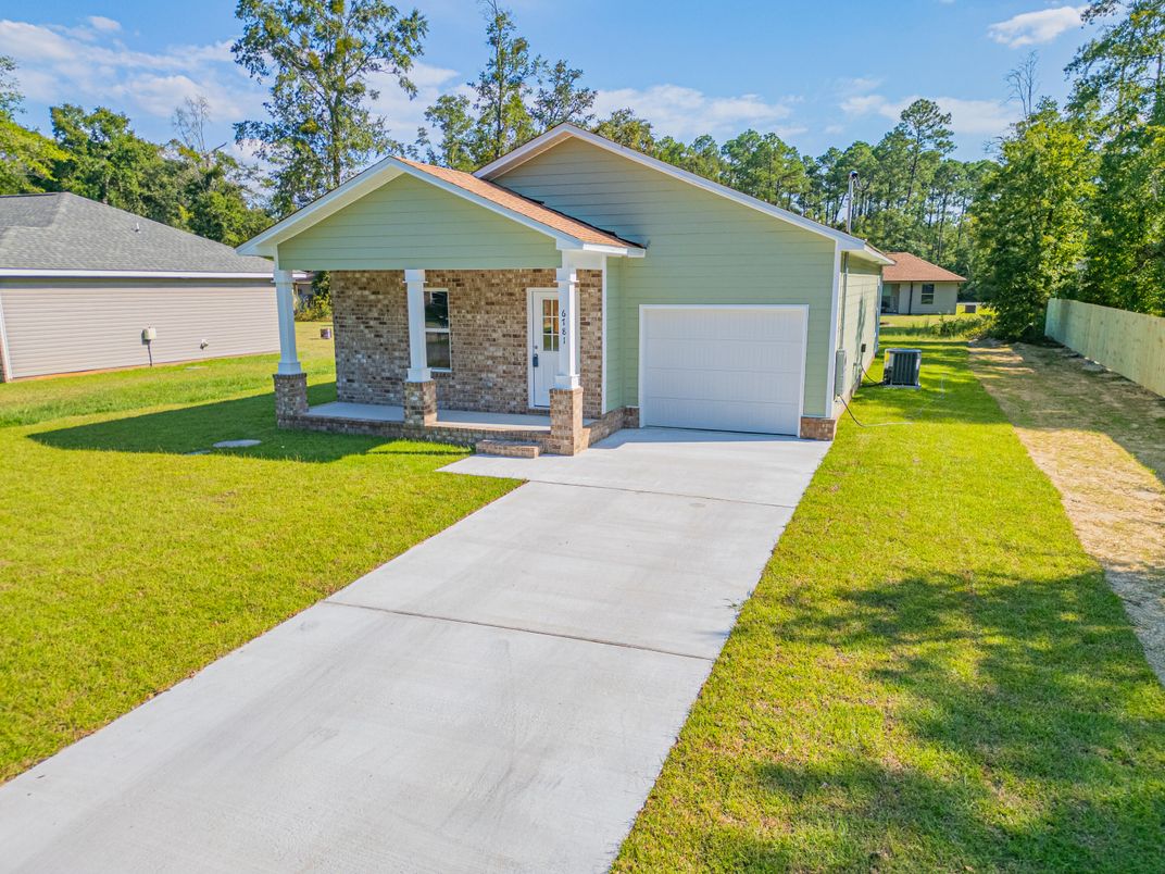 Attached, Backyard, Exterior, Facade, Brick Facade, Ranch