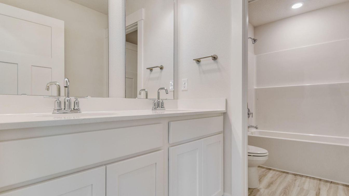 Bathroom, Dual Sink Vanities, Interior, Recessed Lighting, Wood Texture Flooring