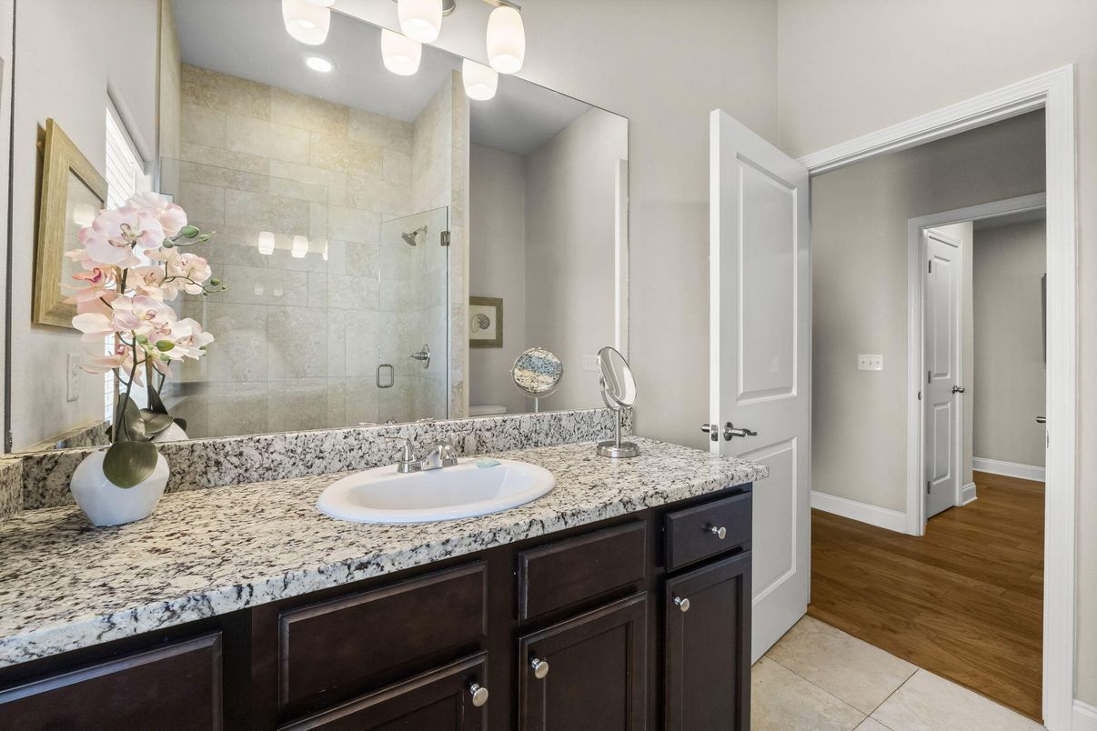 Bathroom, Dual Sink Vanities, Glass Shower, Interior, Recessed Lighting, Wood Texture Flooring
