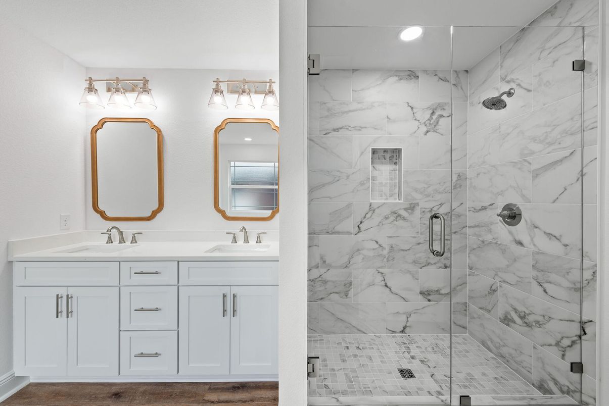 Bathroom, Dual Sink Vanities, Glass Shower, Interior, Marble Walls, Recessed Lighting, Wood Texture Flooring