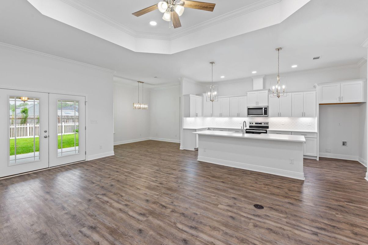 Chandelier, Empty room, Interior, Kitchen, Pendant Lights, Recessed Lighting, Stainless Steel Appliances, Wood Texture Flooring