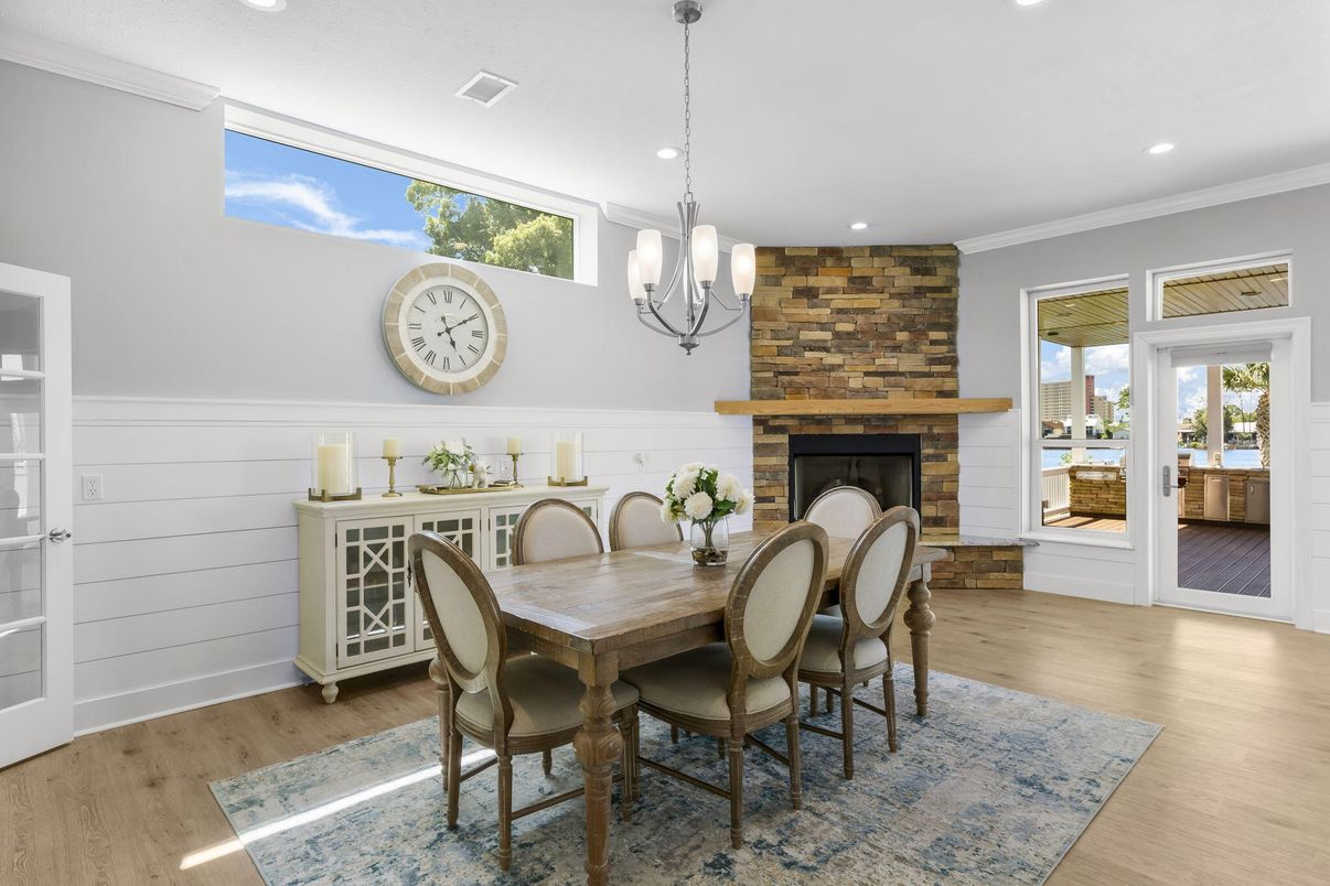 Dining room, Fireplace, Interior, Pendant Lights, Recessed Lighting, Stone Walls, Wood Texture Flooring