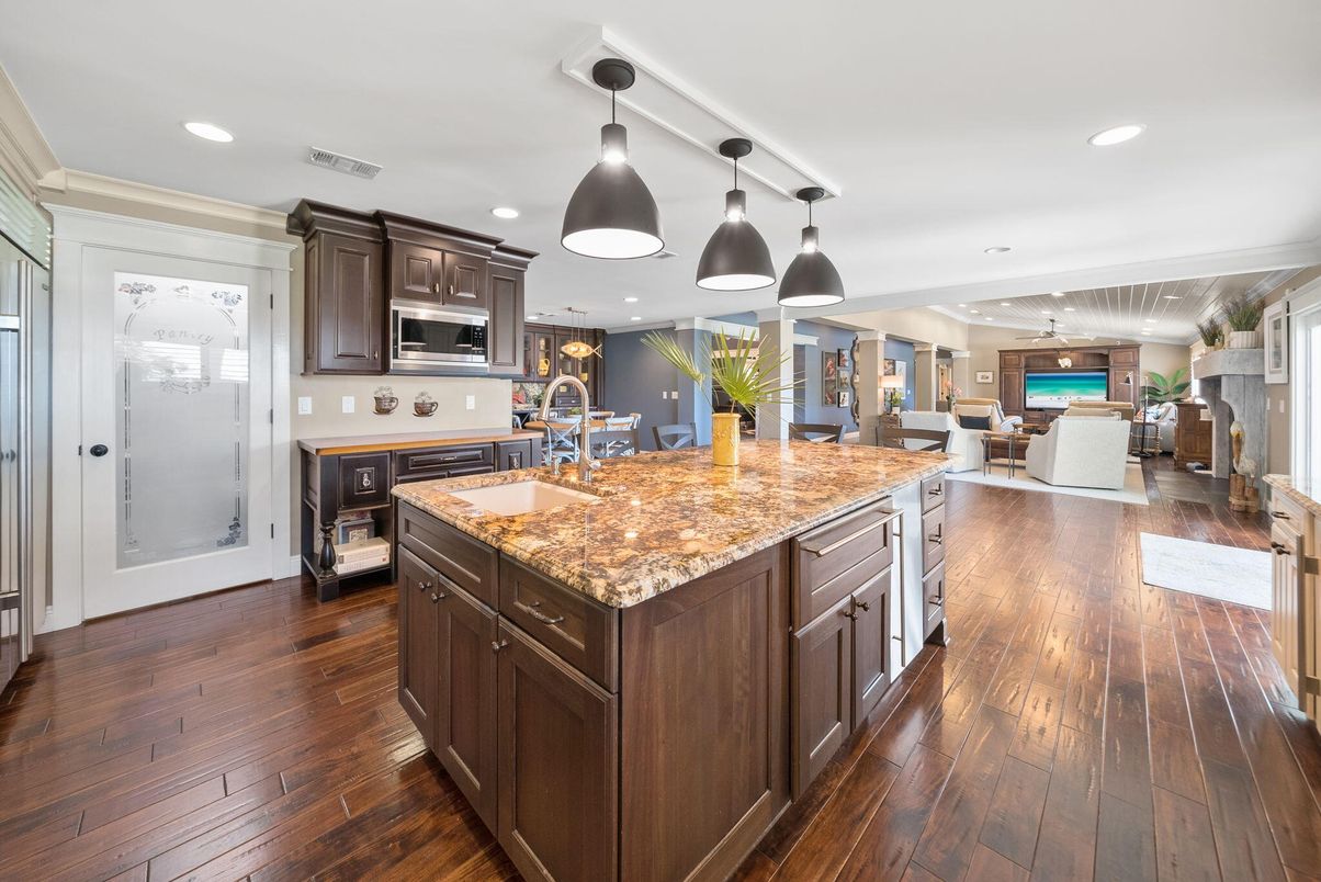 Dining room, Interior, Kitchen, Living room, Pendant Lights, Recessed Lighting, Stainless Steel Appliances, Wood Texture Flooring