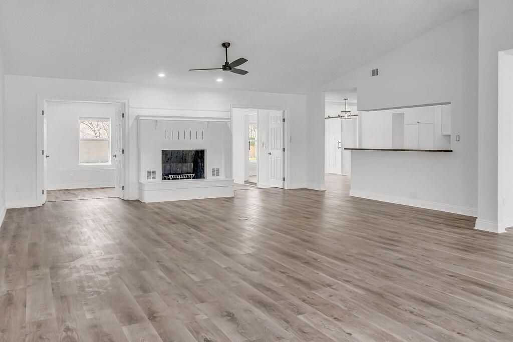 Empty room, Fireplace, Interior, Recessed Lighting, Wood Texture Flooring