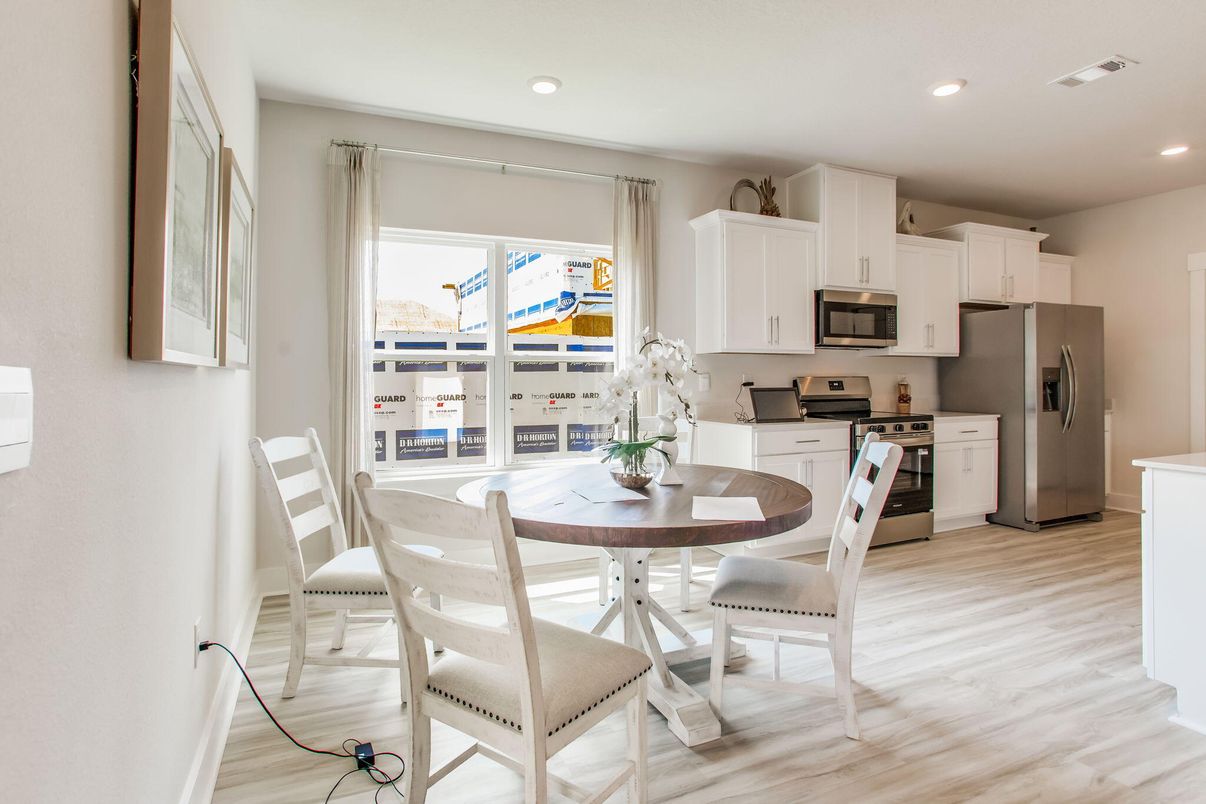Dining room, Interior, Kitchen, Recessed Lighting, Stainless Steel Appliances, Wood Texture Flooring