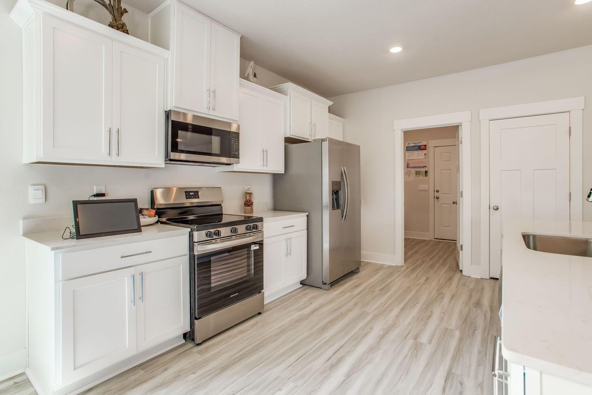 Interior, Kitchen, Recessed Lighting, Stainless Steel Appliances, Wood Texture Flooring