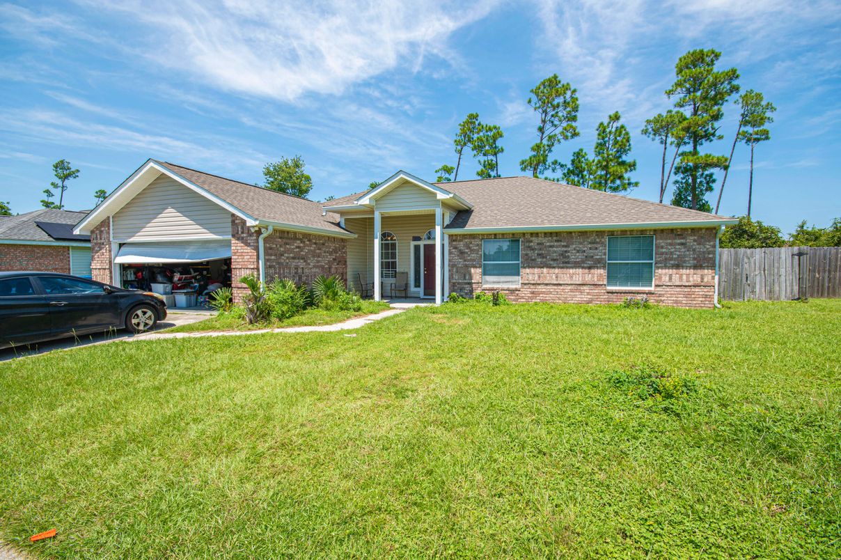 Attached, Backyard, Exterior, Facade, Brick Facade, Ranch