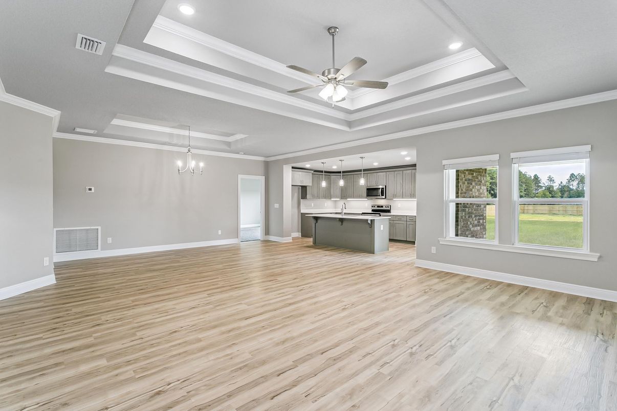 Empty room, Interior, Kitchen, Pendant Lights, Recessed Lighting, Stainless Steel Appliances, Wood Texture Flooring