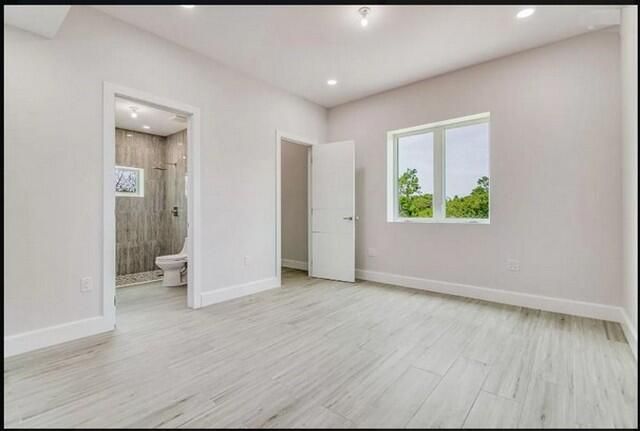Bathroom, Empty room, Interior, Recessed Lighting, Wood Texture Flooring