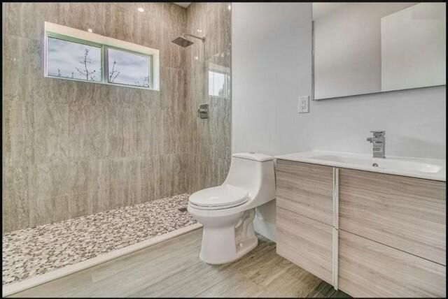 Bathroom, Glass Shower, Interior, Recessed Lighting, Wood Texture Flooring