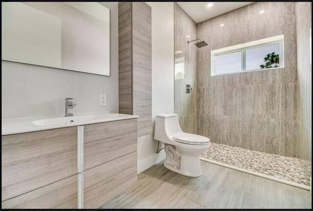 Bathroom, Glass Shower, Interior, Recessed Lighting, Wood Texture Flooring