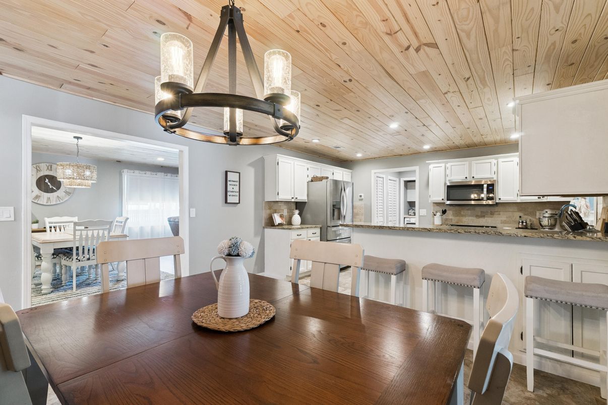 Chandelier, Dining room, Interior, Kitchen, Pendant Lights, Recessed Lighting, Stainless Steel Appliances, Wooden Ceilings