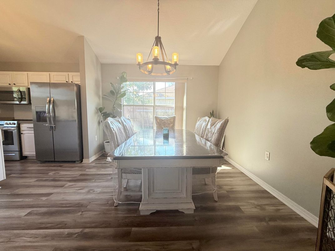 Dining room, Interior, Kitchen, Pendant Lights, Stainless Steel Appliances, Wood Texture Flooring