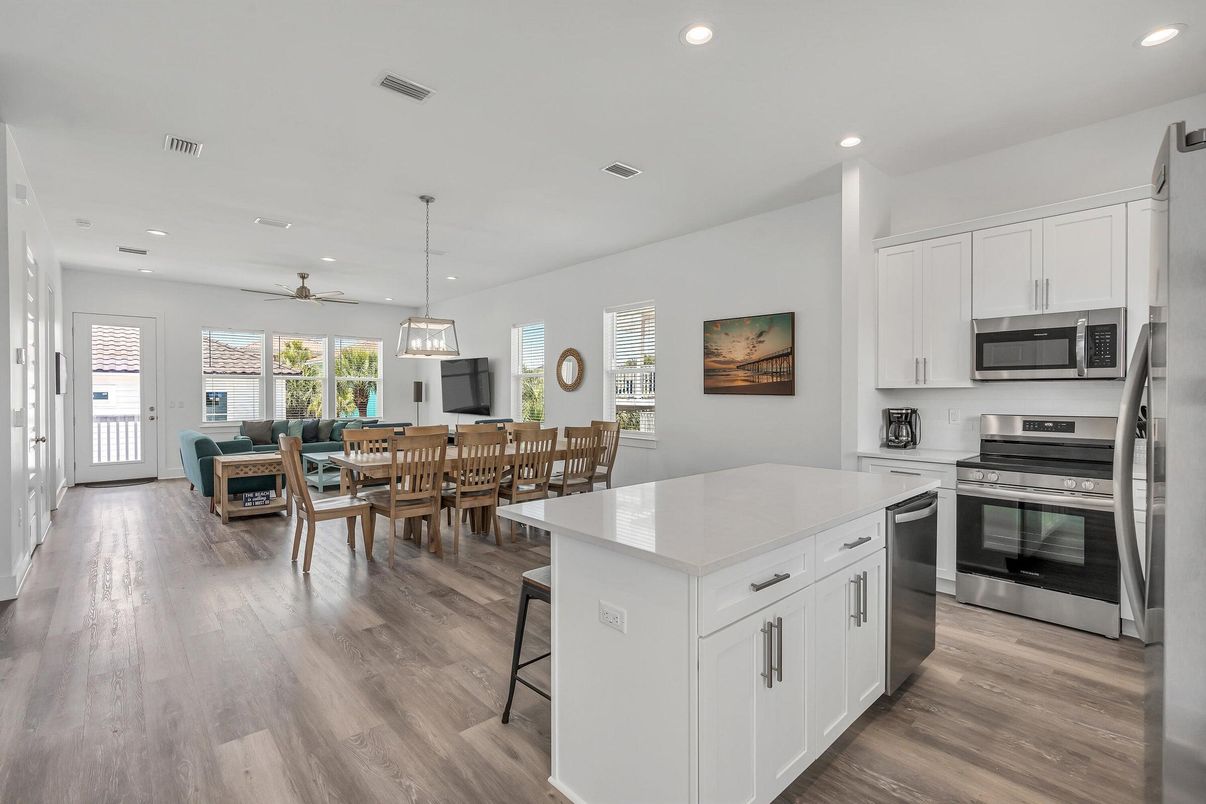 Dining room, Interior, Kitchen, Living room, Pendant Lights, Recessed Lighting, Stainless Steel Appliances, Wood Texture Flooring