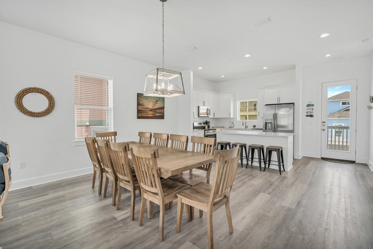 Dining room, Interior, Kitchen, Pendant Lights, Recessed Lighting, Stainless Steel Appliances, Wood Texture Flooring