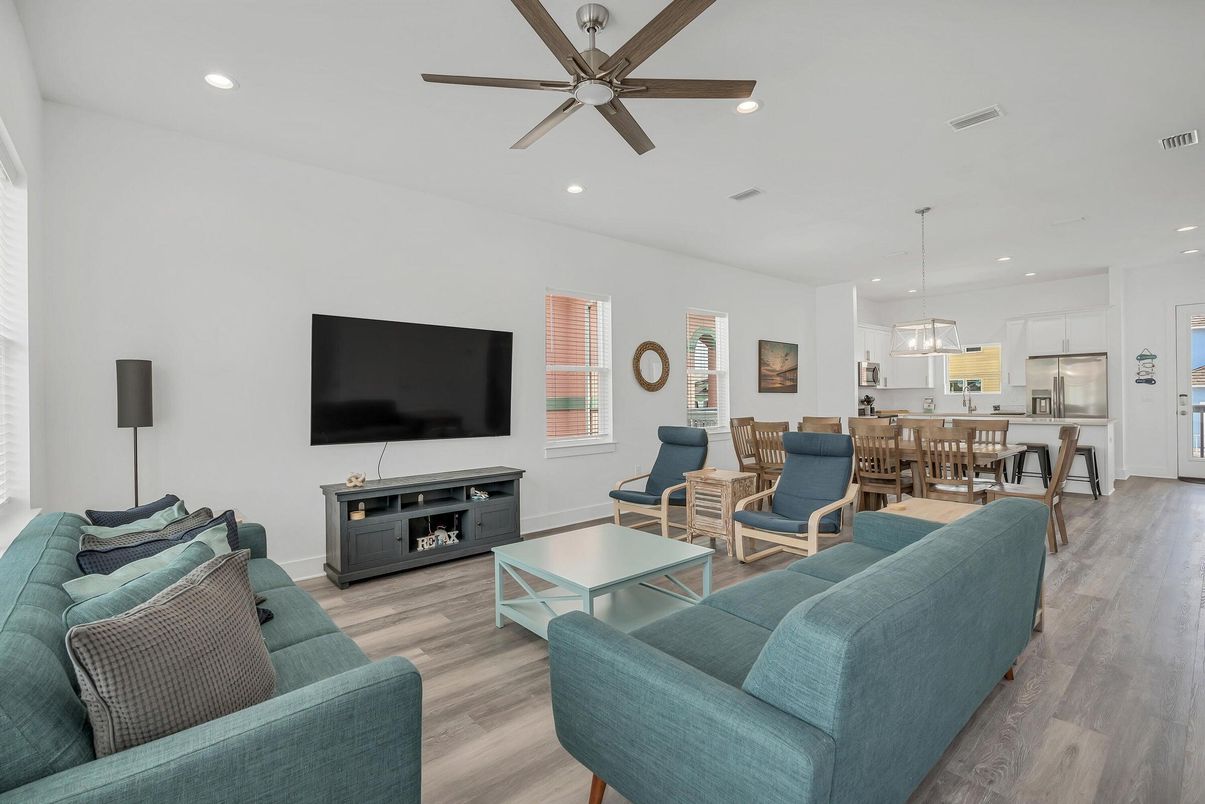 Dining room, Fireplace, Interior, Kitchen, Living room, Pendant Lights, Recessed Lighting, Stainless Steel Appliances, Wood Texture Flooring