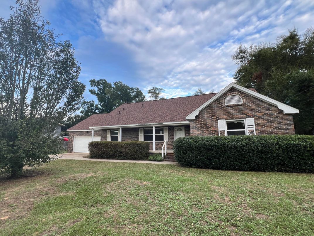 Attached, Backyard, Exterior, Facade, Brick Facade, Ranch