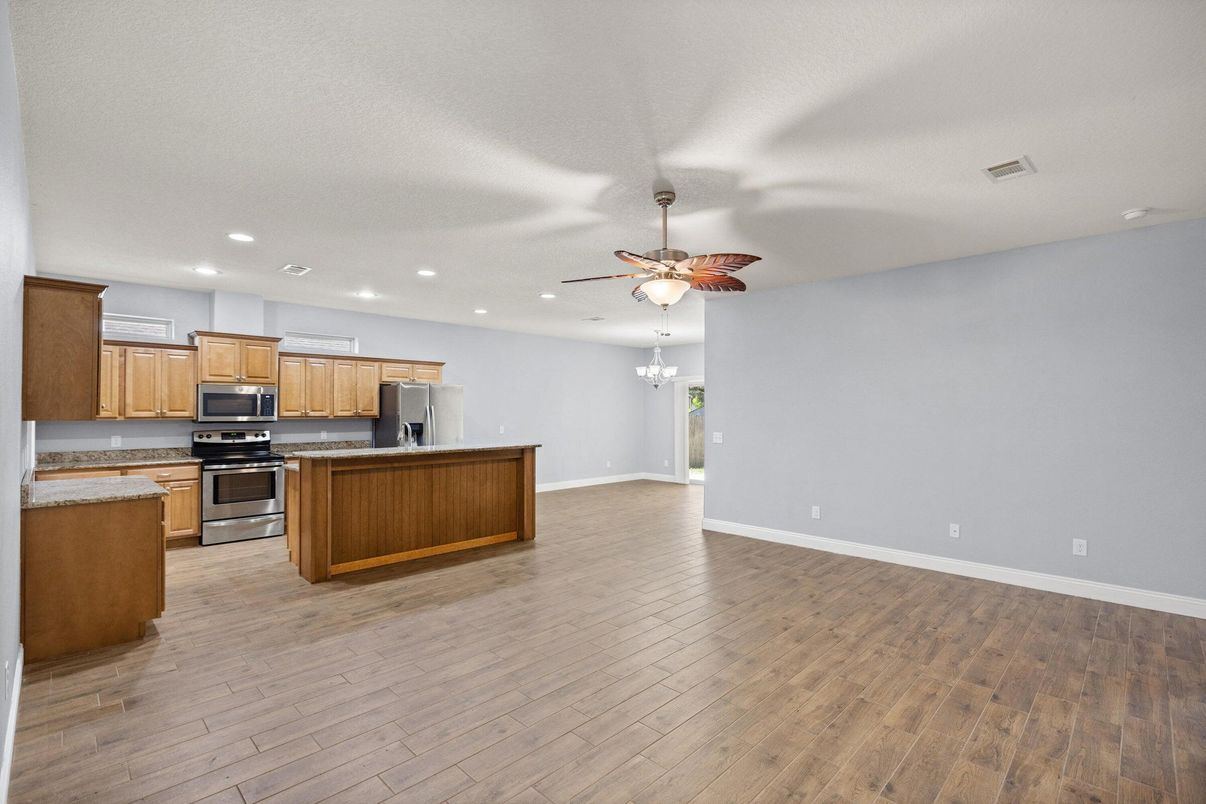 Chandelier, Interior, Kitchen, Recessed Lighting, Stainless Steel Appliances, Wood Texture Flooring