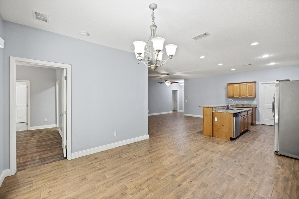 Chandelier, Empty room, Interior, Kitchen, Recessed Lighting, Wood Texture Flooring