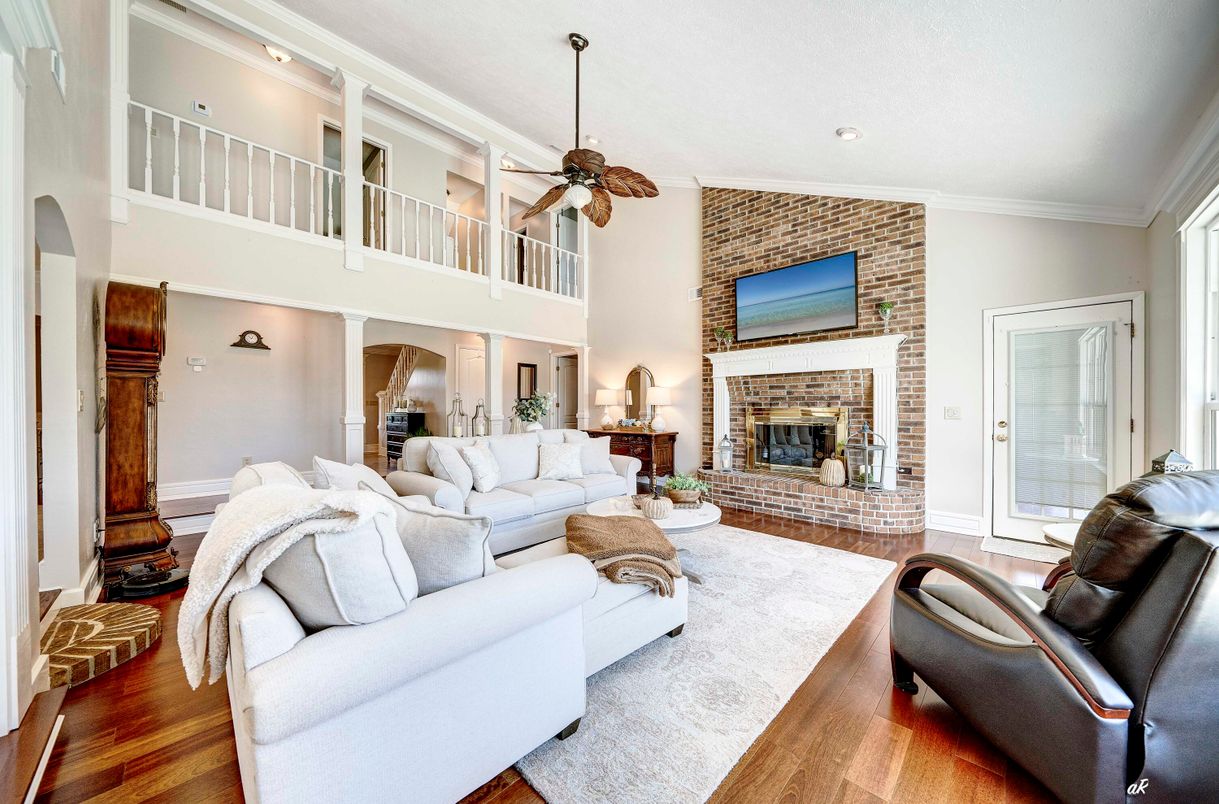 Fireplace, Interior, Living room, Recessed Lighting, Stone Walls, Wood Texture Flooring