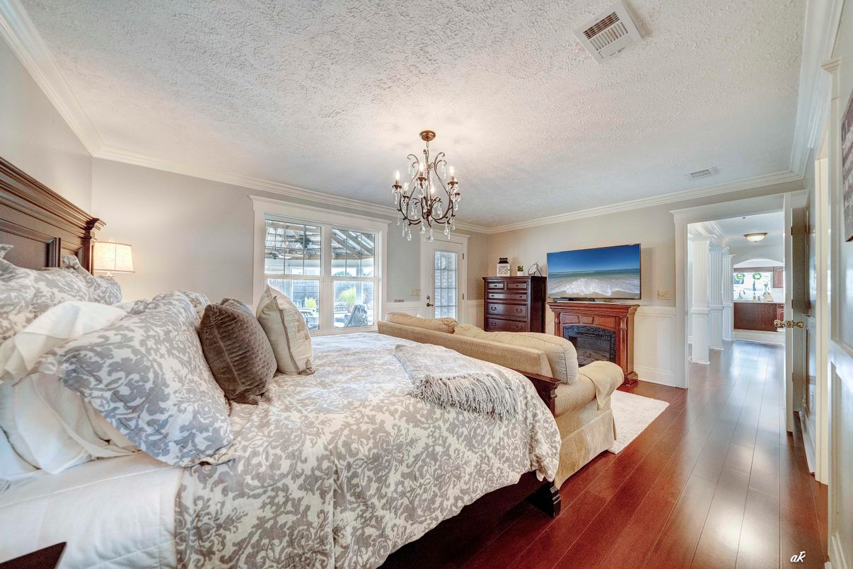 Bedroom, Chandelier, Fireplace, Interior, Wood Texture Flooring