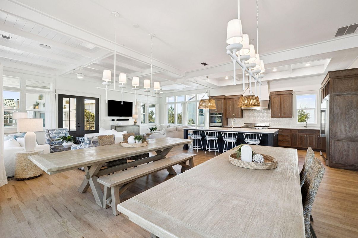 Chandelier, Dining room, Interior, Kitchen, Living room, Pendant Lights, Recessed Lighting, Stainless Steel Appliances, Wood Texture Flooring