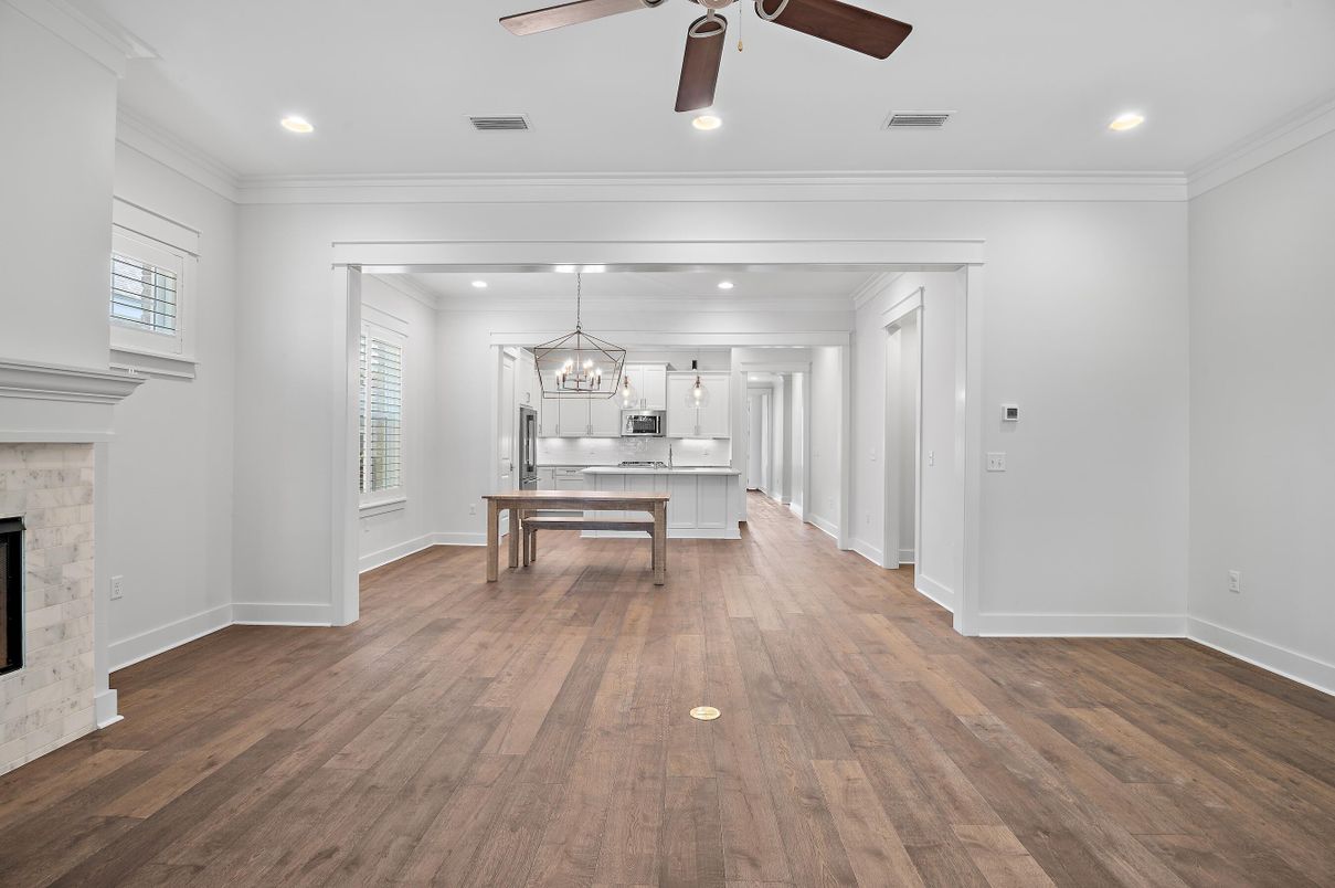 Fireplace, Game Room, Interior, Pendant Lights, Recessed Lighting, Wood Texture Flooring