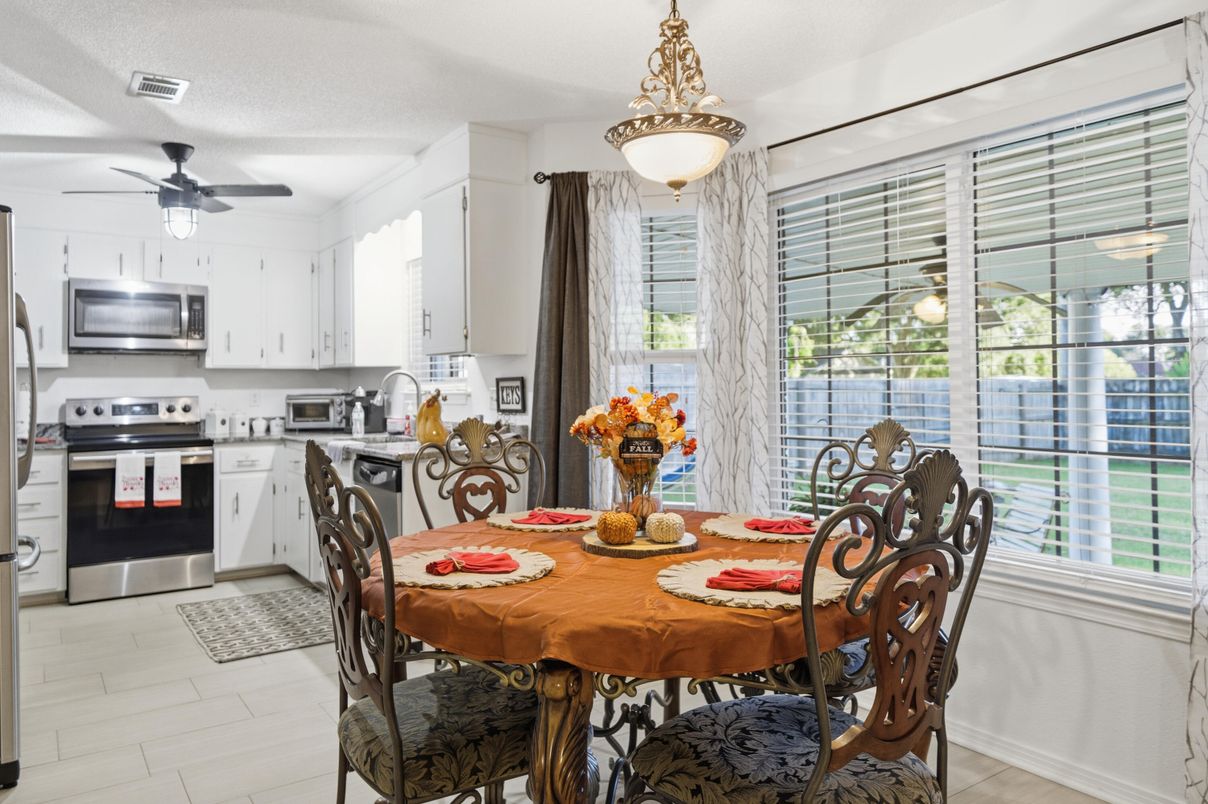 Dining room, Interior, Kitchen, Pendant Lights, Stainless Steel Appliances, Wood Texture Flooring