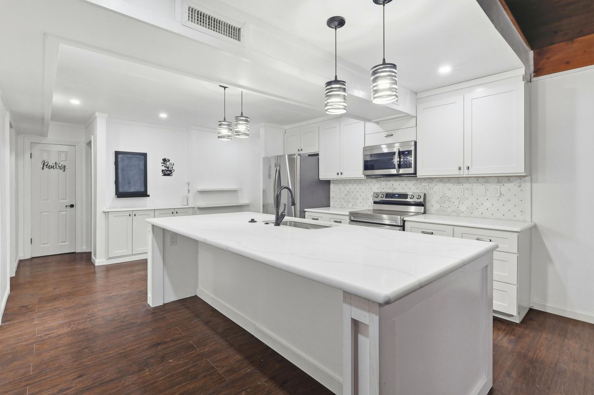 Interior, Kitchen, Pendant Lights, Recessed Lighting, Stainless Steel Appliances, Wood Texture Flooring