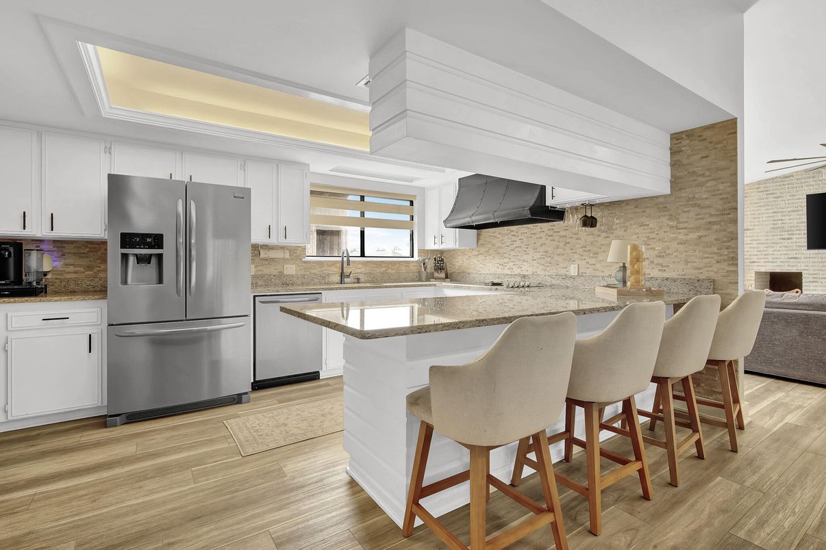 Interior, Kitchen, Recessed Lighting, Stainless Steel Appliances, Stone Walls, Wood Texture Flooring