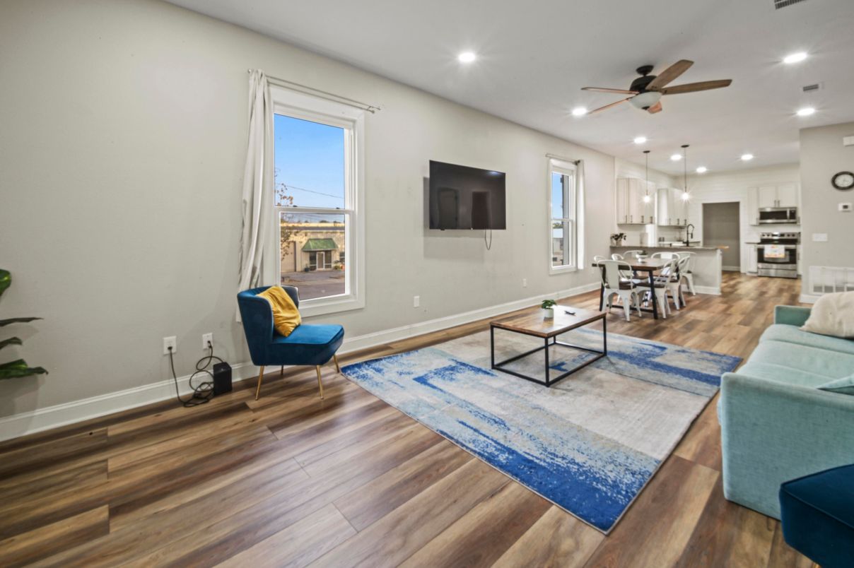 Dining room, Interior, Kitchen, Living room, Pendant Lights, Recessed Lighting, Stainless Steel Appliances, Wood Texture Flooring