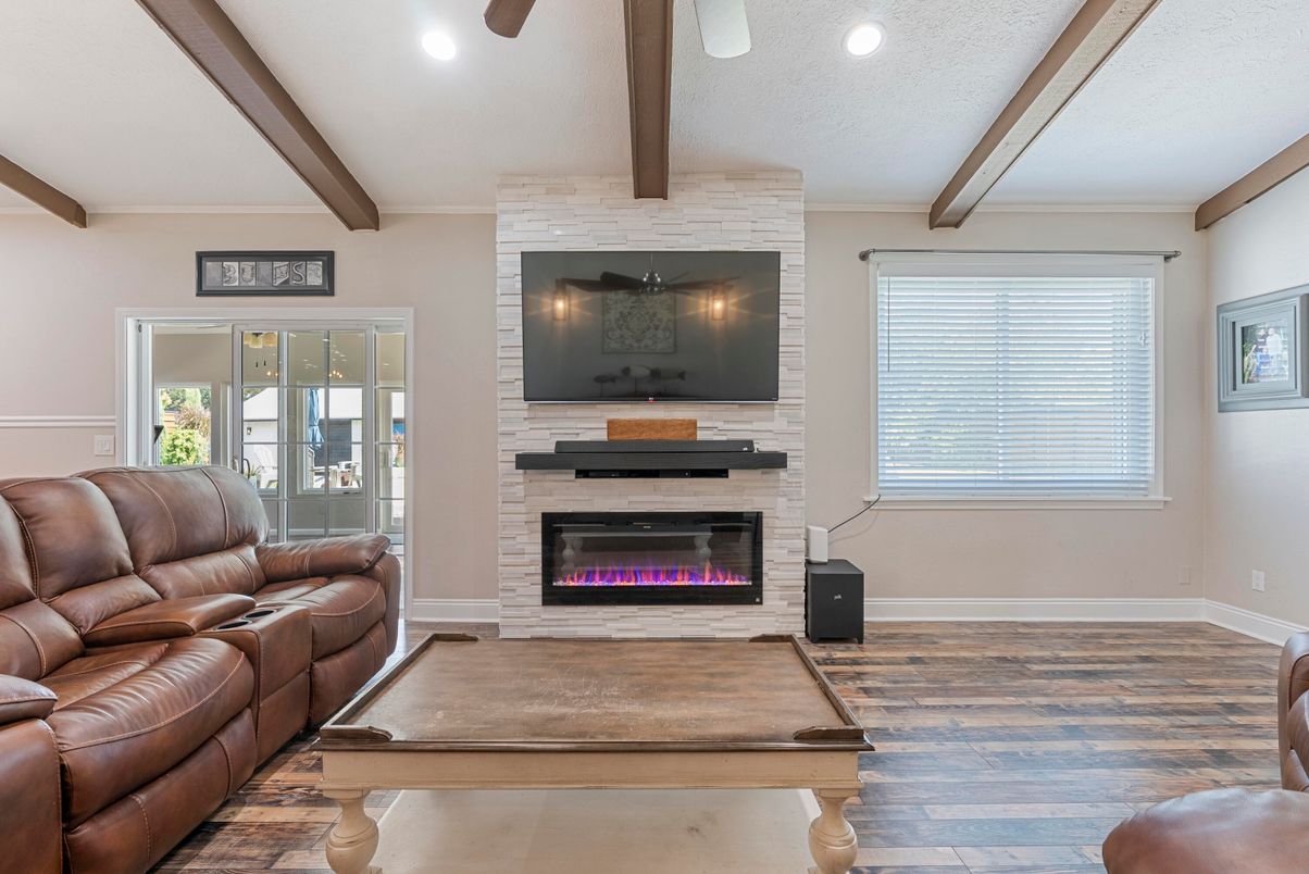 Fireplace, Interior, Living room, Recessed Lighting, Stone Walls, Wooden Beams, Wood Texture Flooring