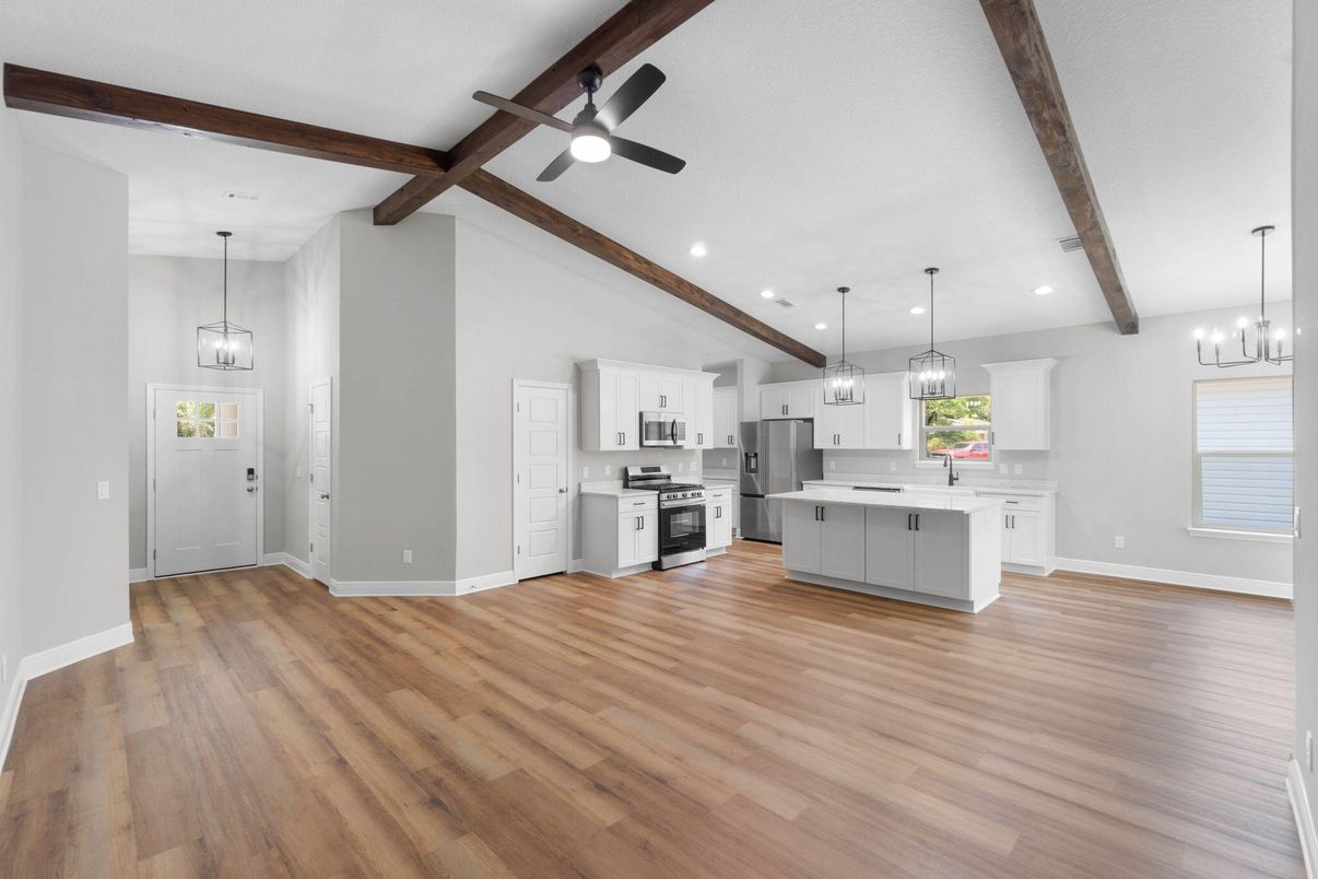 Chandelier, Empty room, Interior, Kitchen, Pendant Lights, Recessed Lighting, Stainless Steel Appliances, Wooden Beams, Wood Texture Flooring