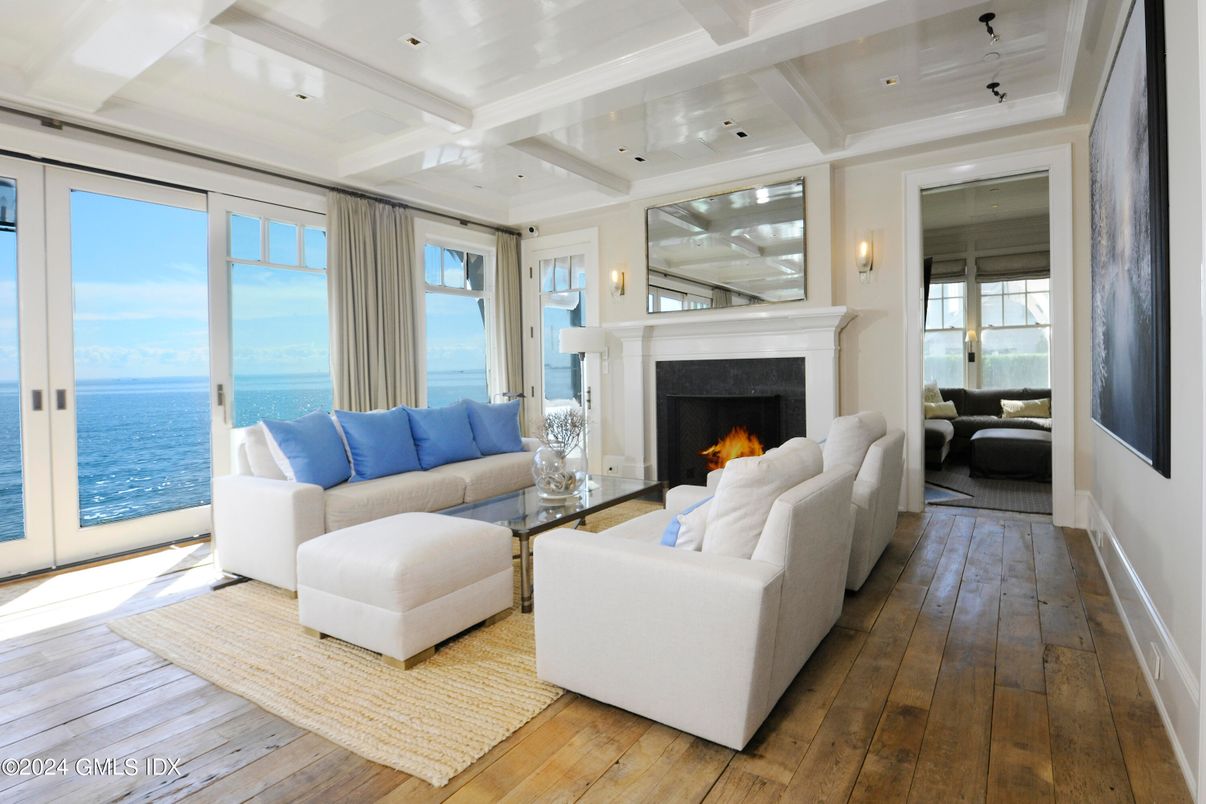 Fireplace, Interior, Living room, Recessed Lighting, Water, Wood Texture Flooring