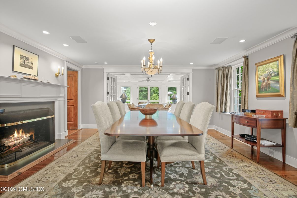 Chandelier, Dining room, Fireplace, Interior, Recessed Lighting, Wood Texture Flooring