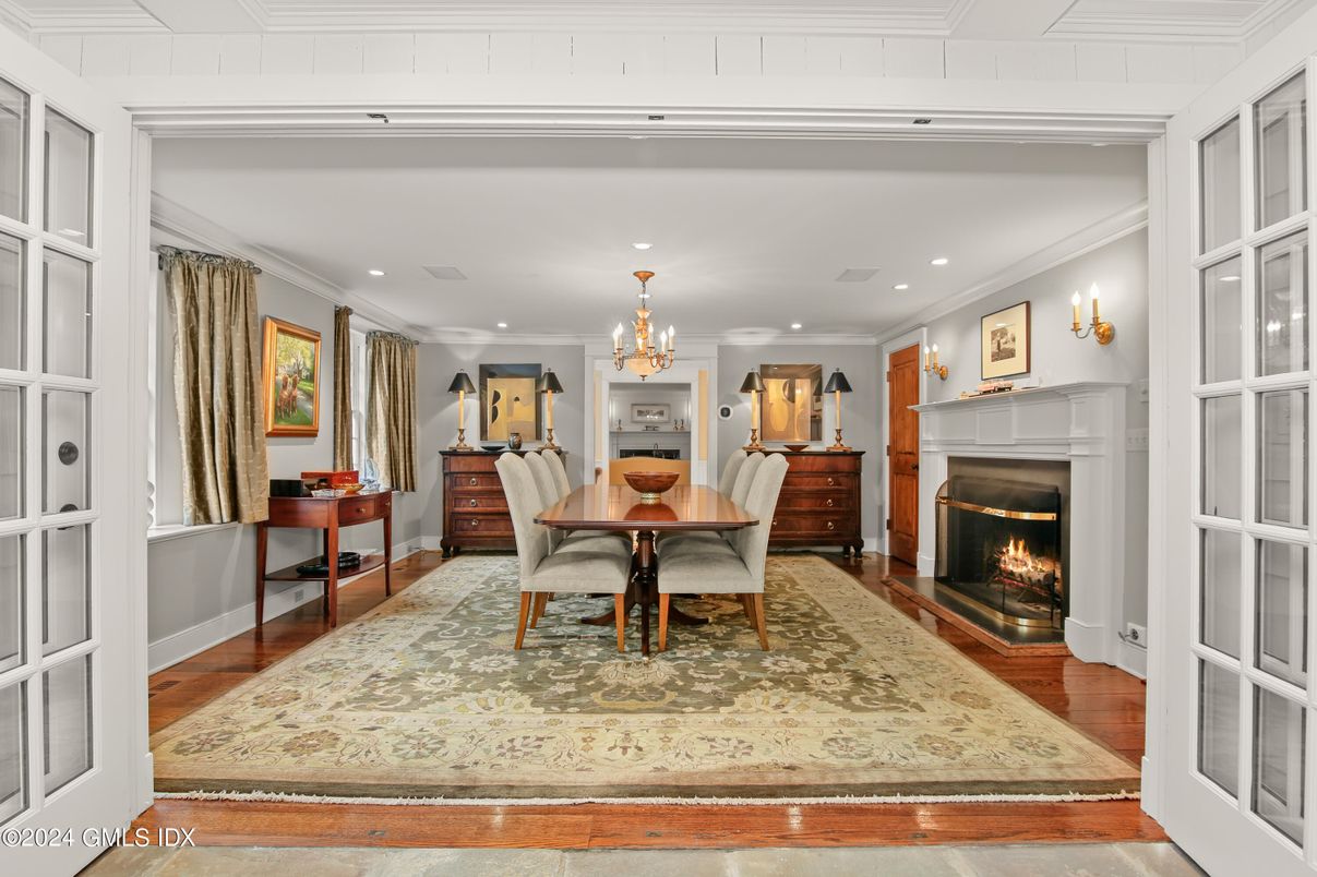 Chandelier, Dining room, Fireplace, Interior, Recessed Lighting, Wood Texture Flooring