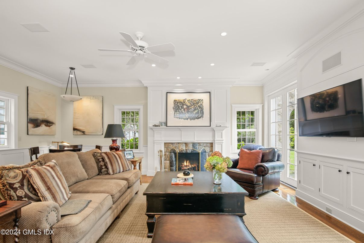 Dining room, Fireplace, Interior, Living room, Pendant Lights, Recessed Lighting, Wood Texture Flooring