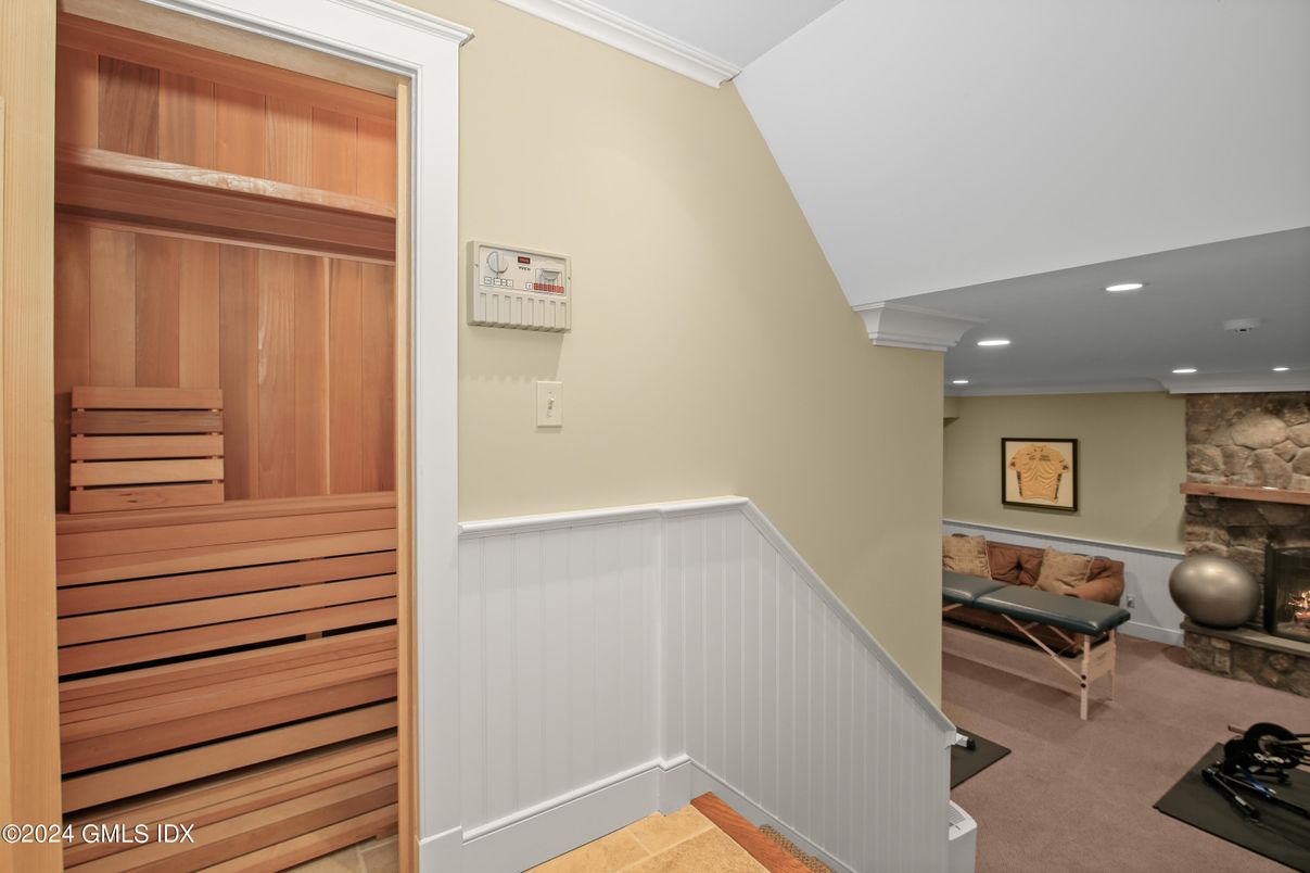 Fireplace, Interior, Recessed Lighting, Sauna Room, Stone Walls