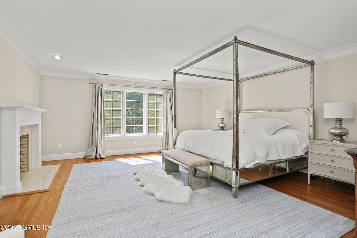Bedroom, Fireplace, Interior, Recessed Lighting, Wood Texture Flooring