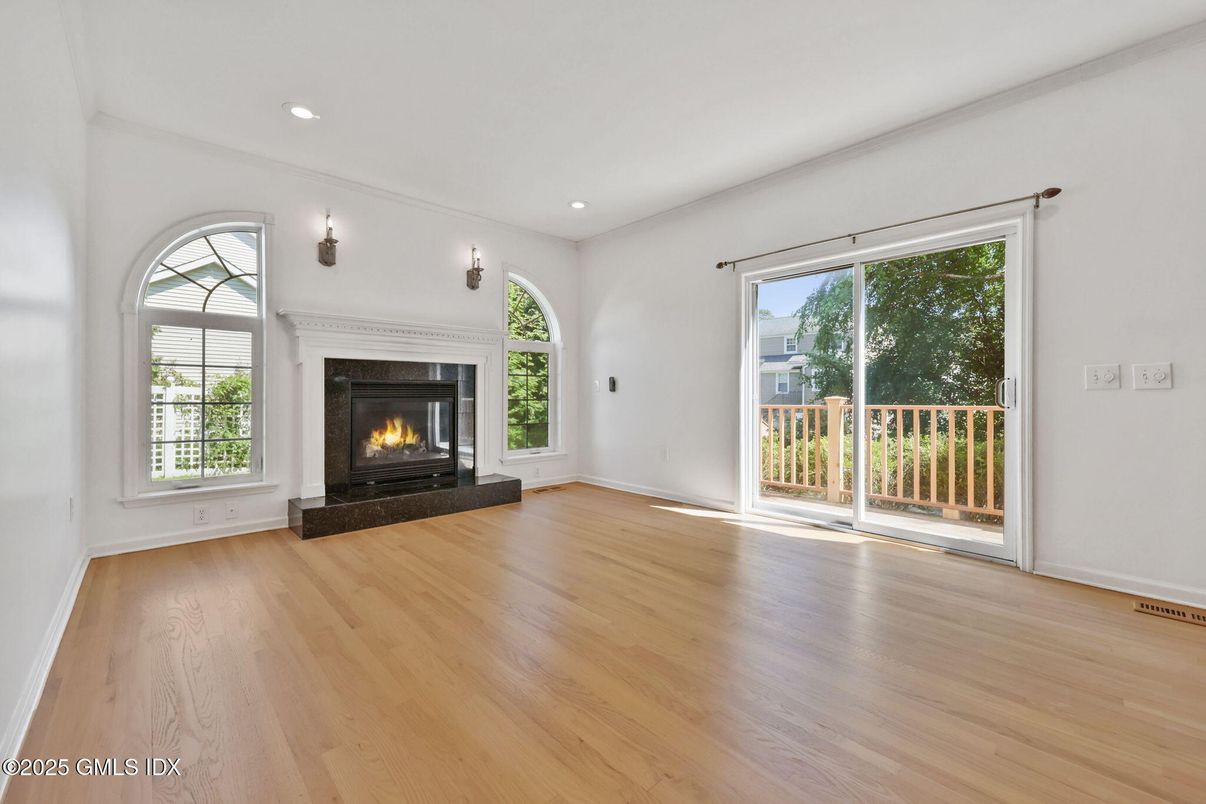 Empty room, Fireplace, Interior, Recessed Lighting, Wood Texture Flooring